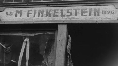 Shop sign reading R.Z. M. Finkelstein 1896, Kraków, 1936
