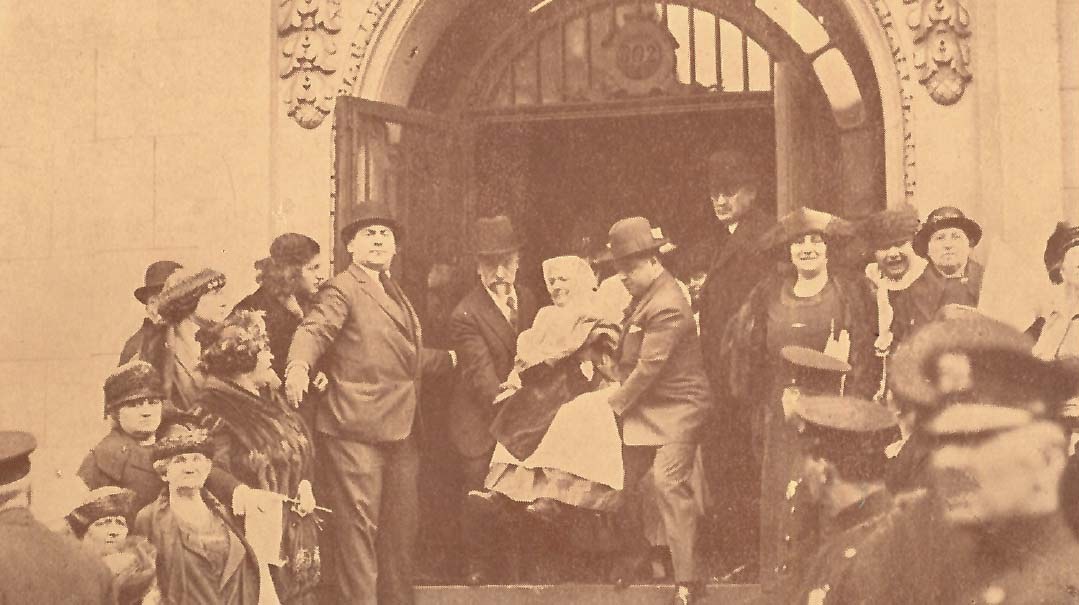 A resident carried through the doorway numbered 302 at the Daughters of Jacob home