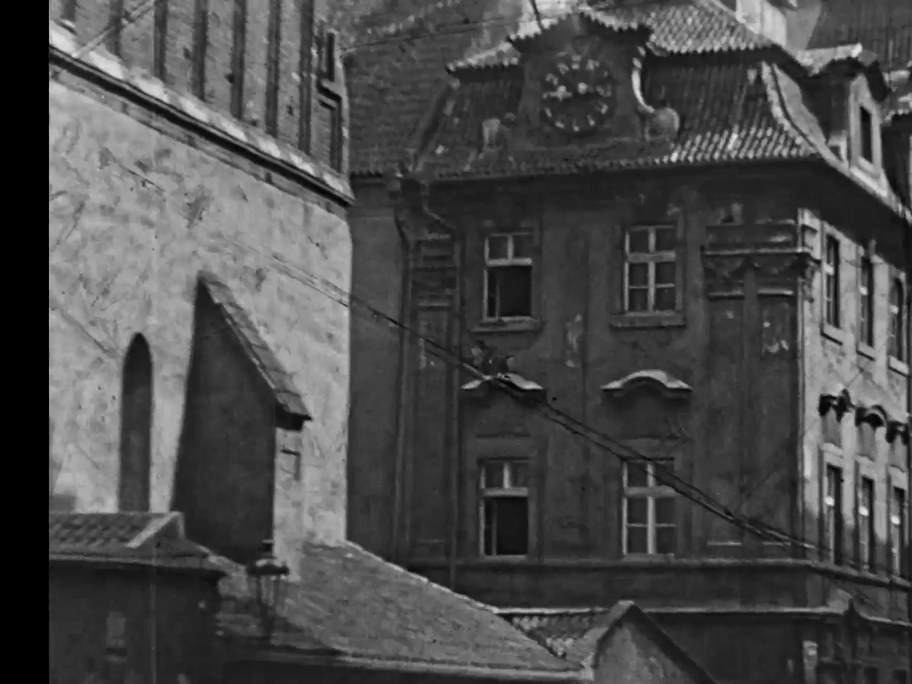 1934 film frame: Old-New Synagogue and Jewish Town Hall from the street