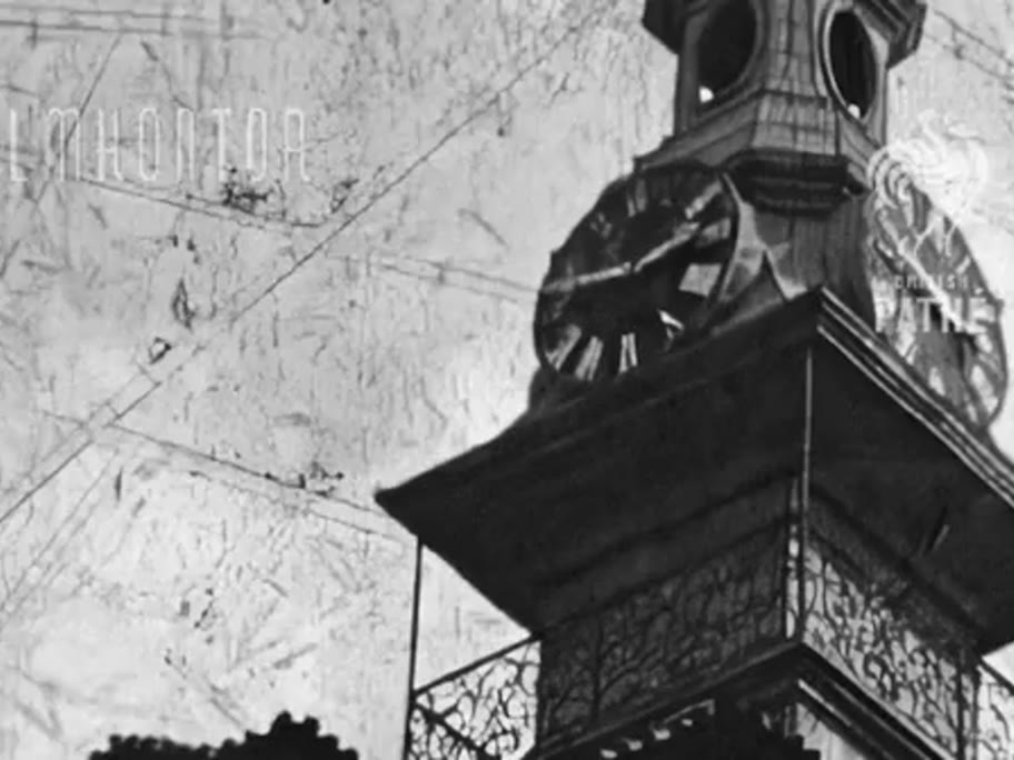 1935 film frame: Jewish Town Hall tower, Hebrew clock below the Roman clock