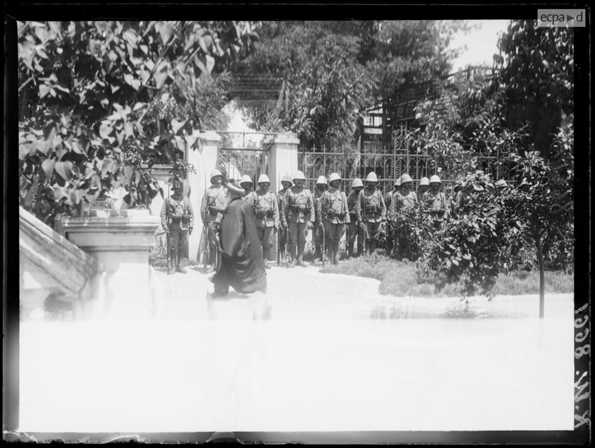 Rabbi Jacob Meir walking past colonial infantry at a Salonika decoration ceremony